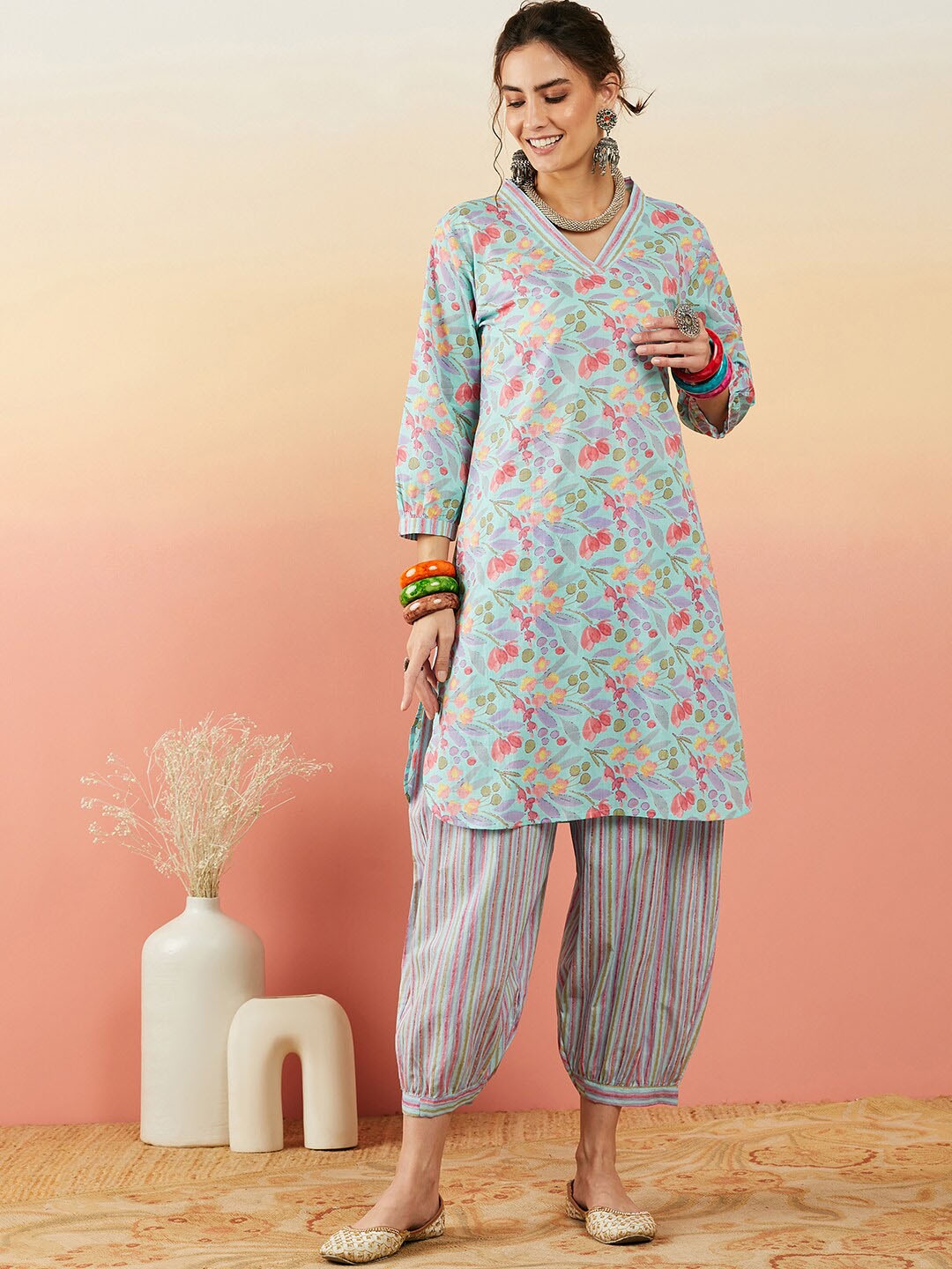 

Sangria Turquoise Blue & Red Floral Printed V-Neck Pure Cotton Kurta With Salwar