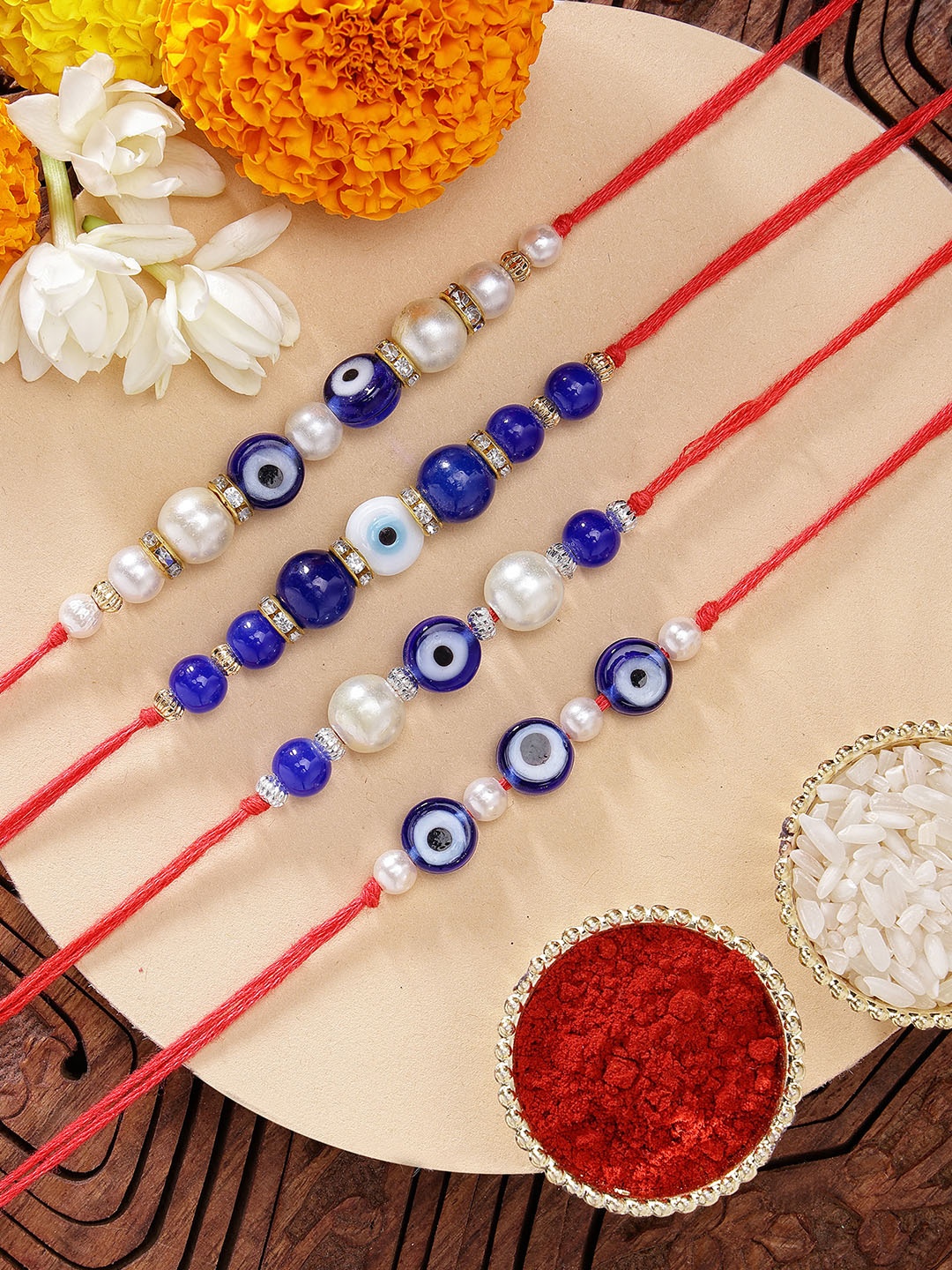

Karatcart Men Set of 4 Evil Eye Handmade Rakhi with Roli & Chawal, Blue