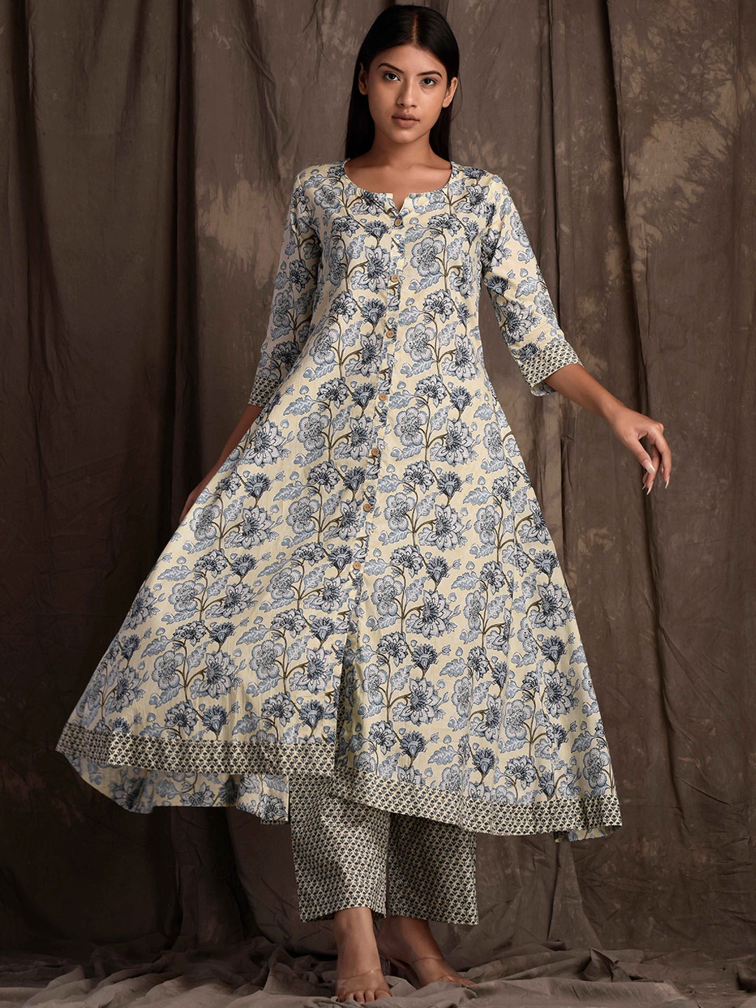 

mokshi Beige Floral Printed A-Line Pure Cotton Kurta With Palazzos