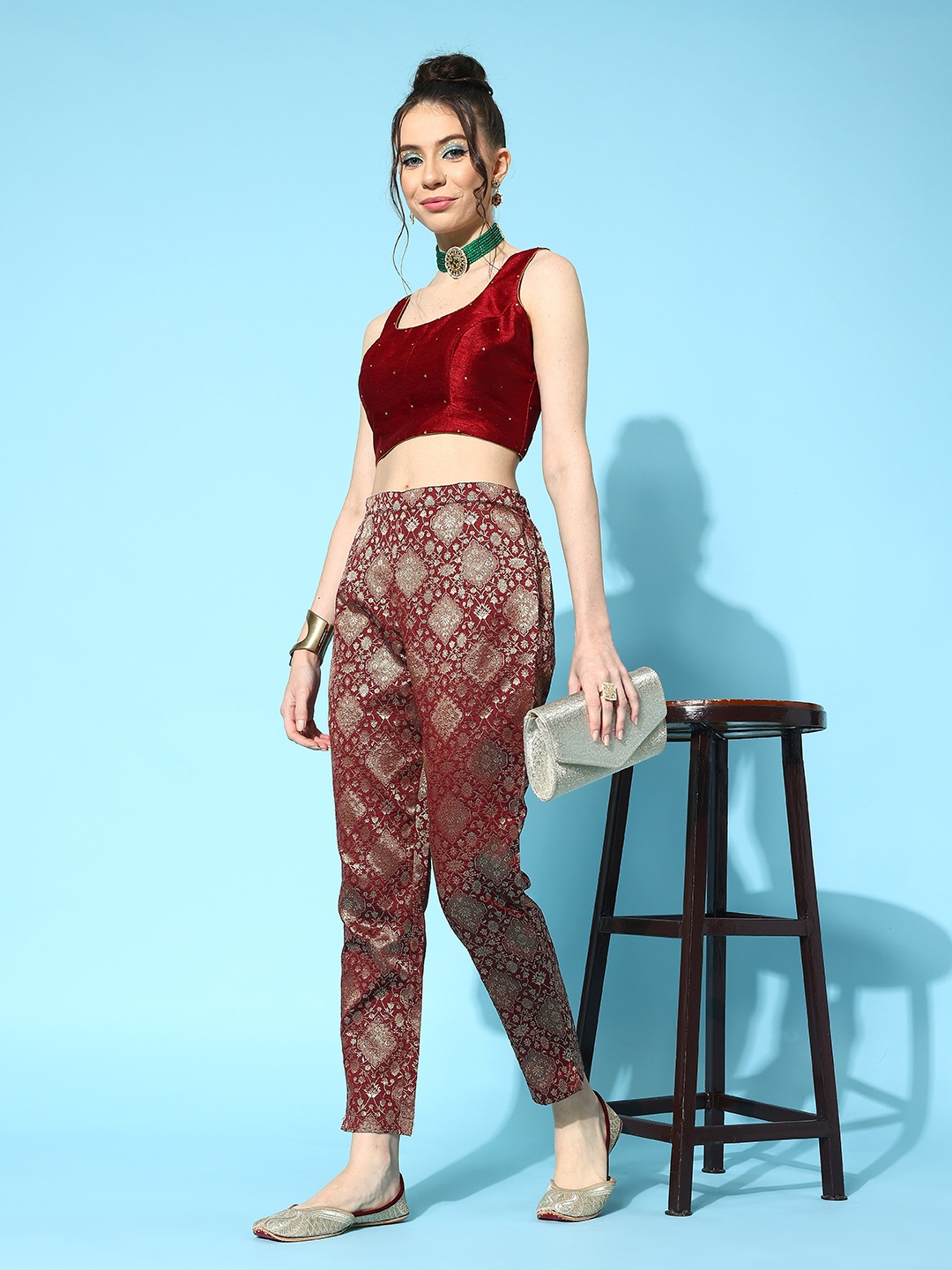 

Sangria Women Ethnic Motifs Embroidered Relaxed Tapered Fit Easy Wash Jacquard Trousers, Maroon