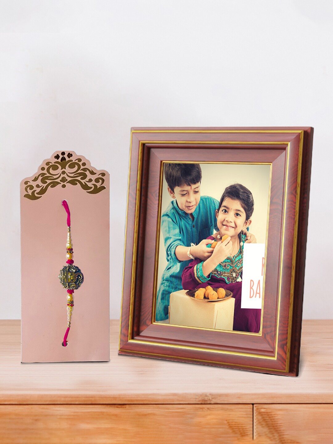 

Art Street Lord Ganesha Rakhi With Photo Frame, Brown