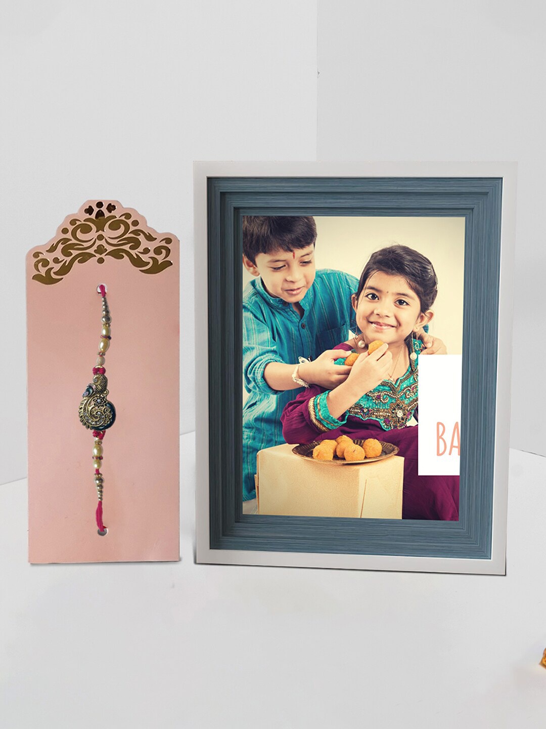 

Art Street Rakhi With Table Top Photo Frame, Blue