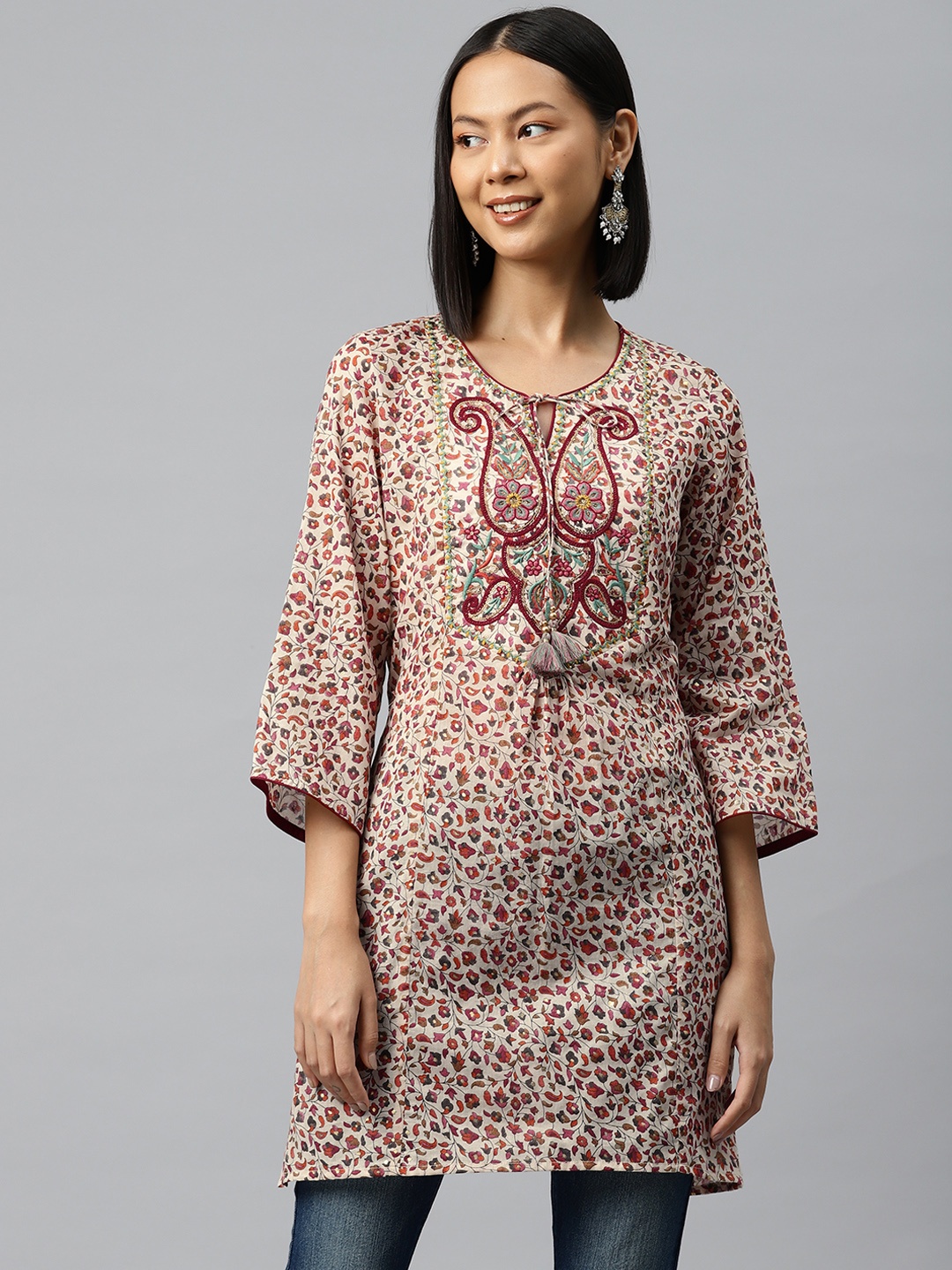 

Nayam By Lakshita Floral Printed Tie-Up Neck Flared Sleeves Sequinned Pure Cotton Kurti, Maroon