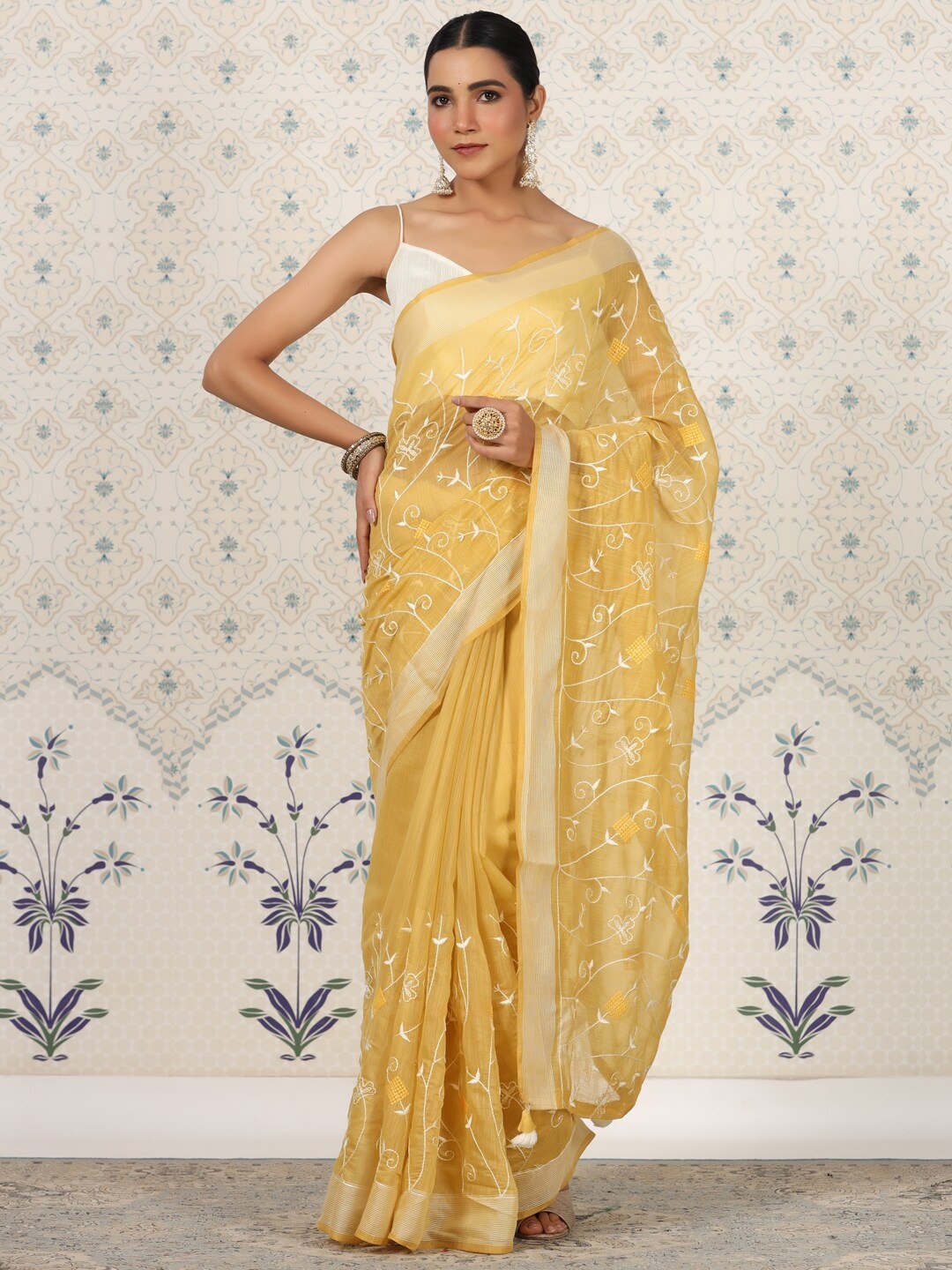

Ode by House of Pataudi Yellow & Gold-Toned Floral Embroidered Saree