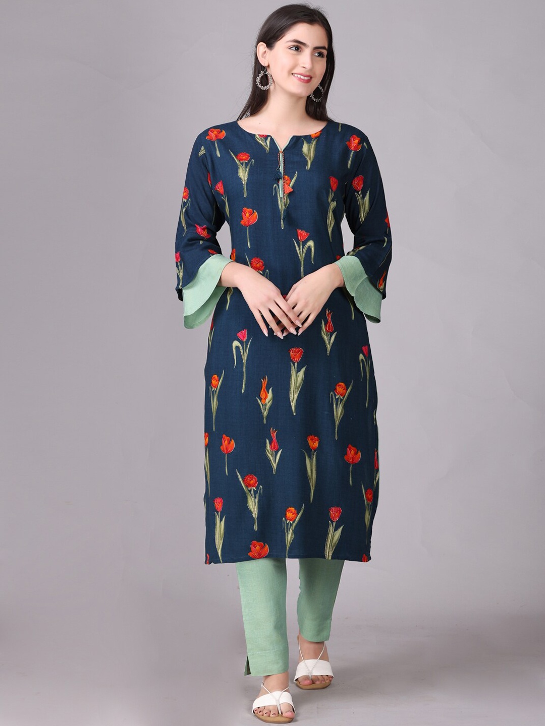 

Elthia Floral Printed Bell Sleeves Kurta With Trousers, Navy blue