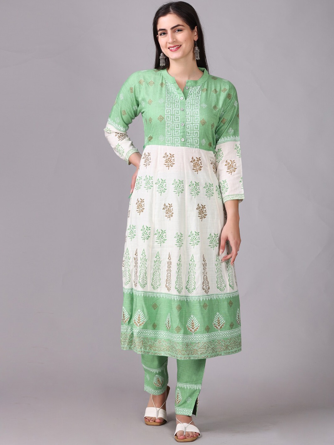 

Elthia Ethnic Motifs Printed Panelled Anarkali Kurta With Trousers, Sea green