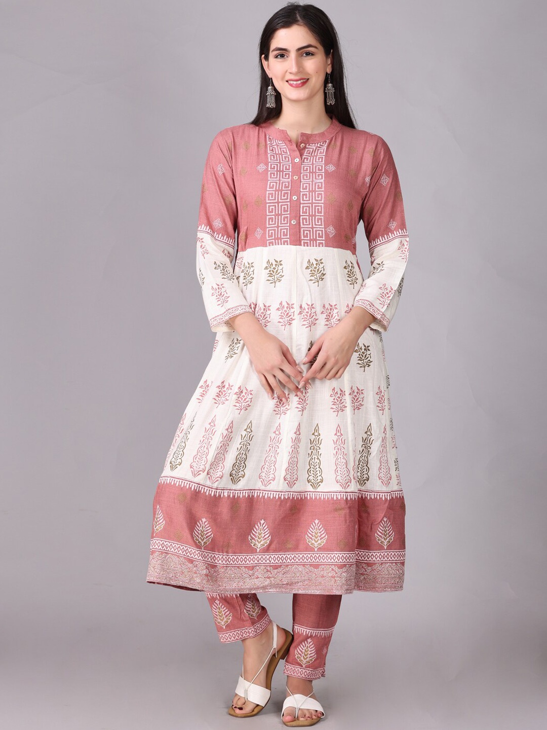 

Elthia Round Neck Ethnic Motifs Printed Regular Kurta with Trousers, Rust