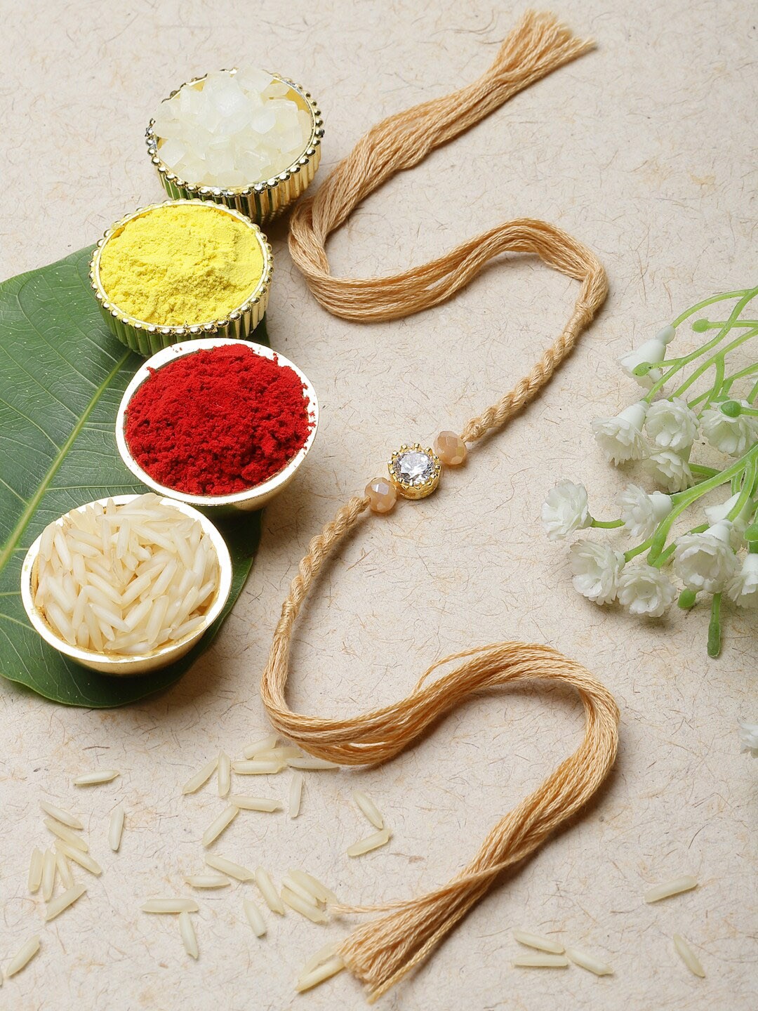 

ZENEME Artificial Stones & Beads Braided Thread Rakhi, Cream