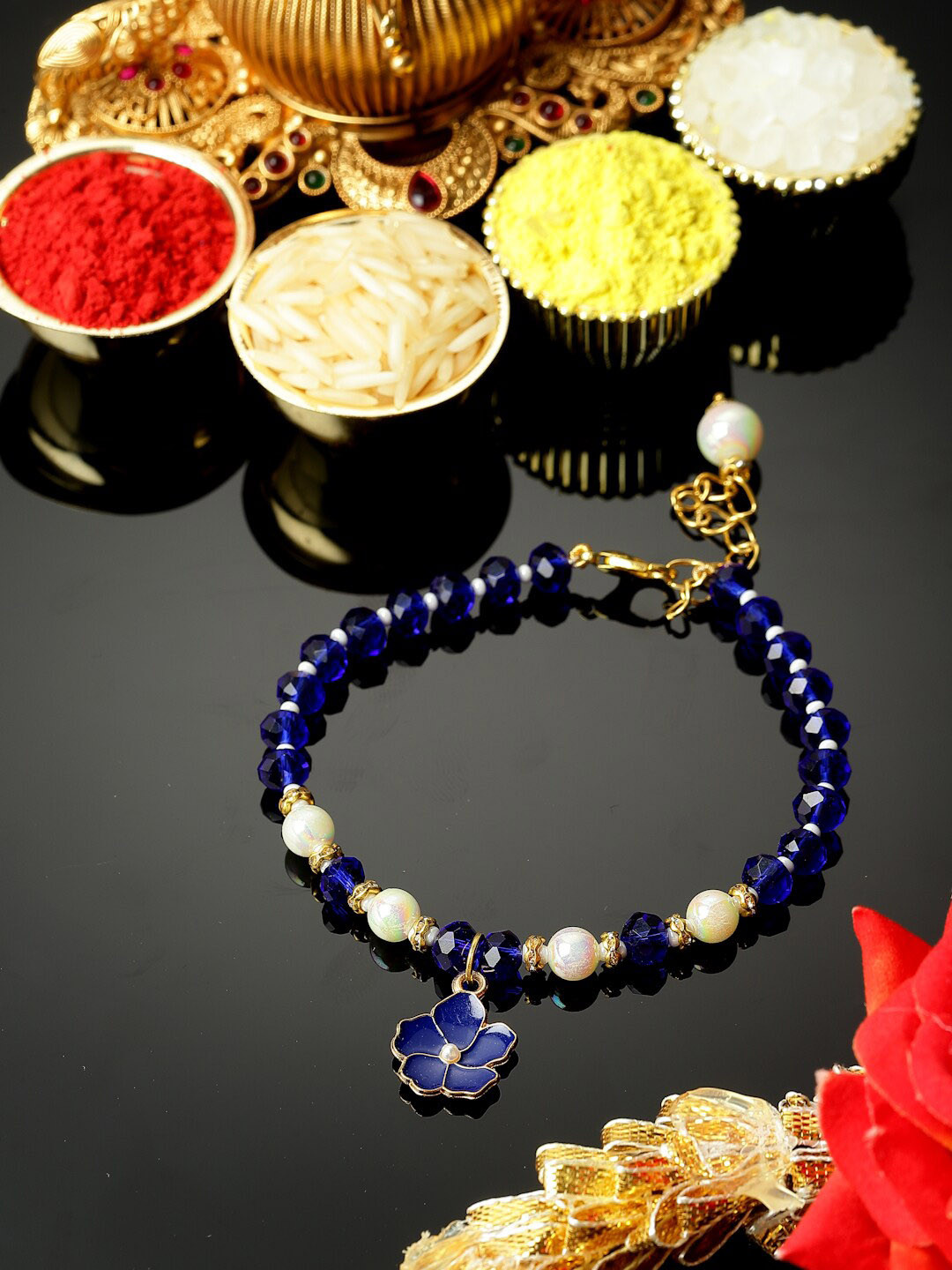 

ZENEME Pearl & Artificial Stones-Studded Wraparound Lumba Rakhi, Navy blue