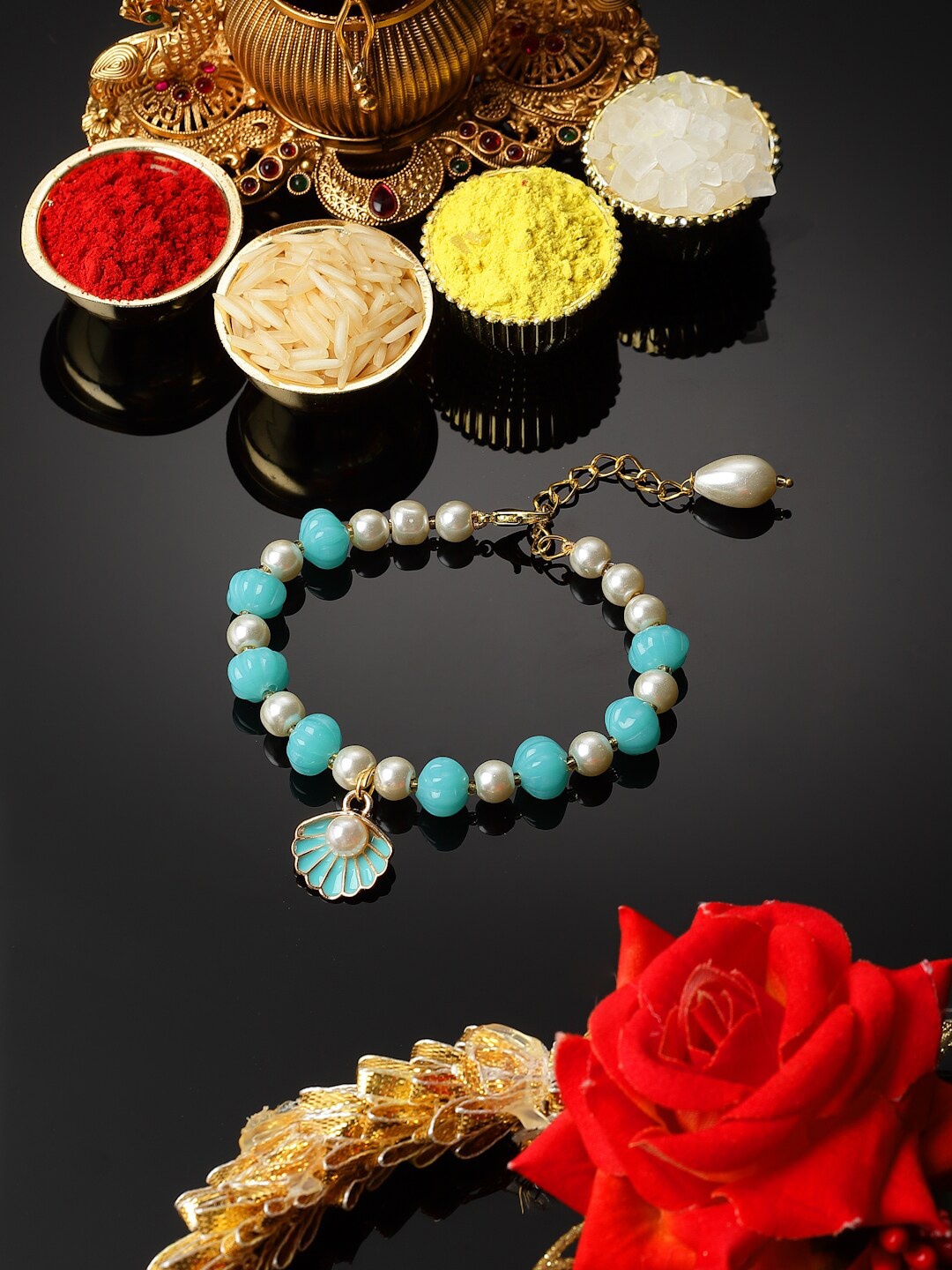 

ZENEME Enameled Stone Studded Lumba Rakhi, Blue