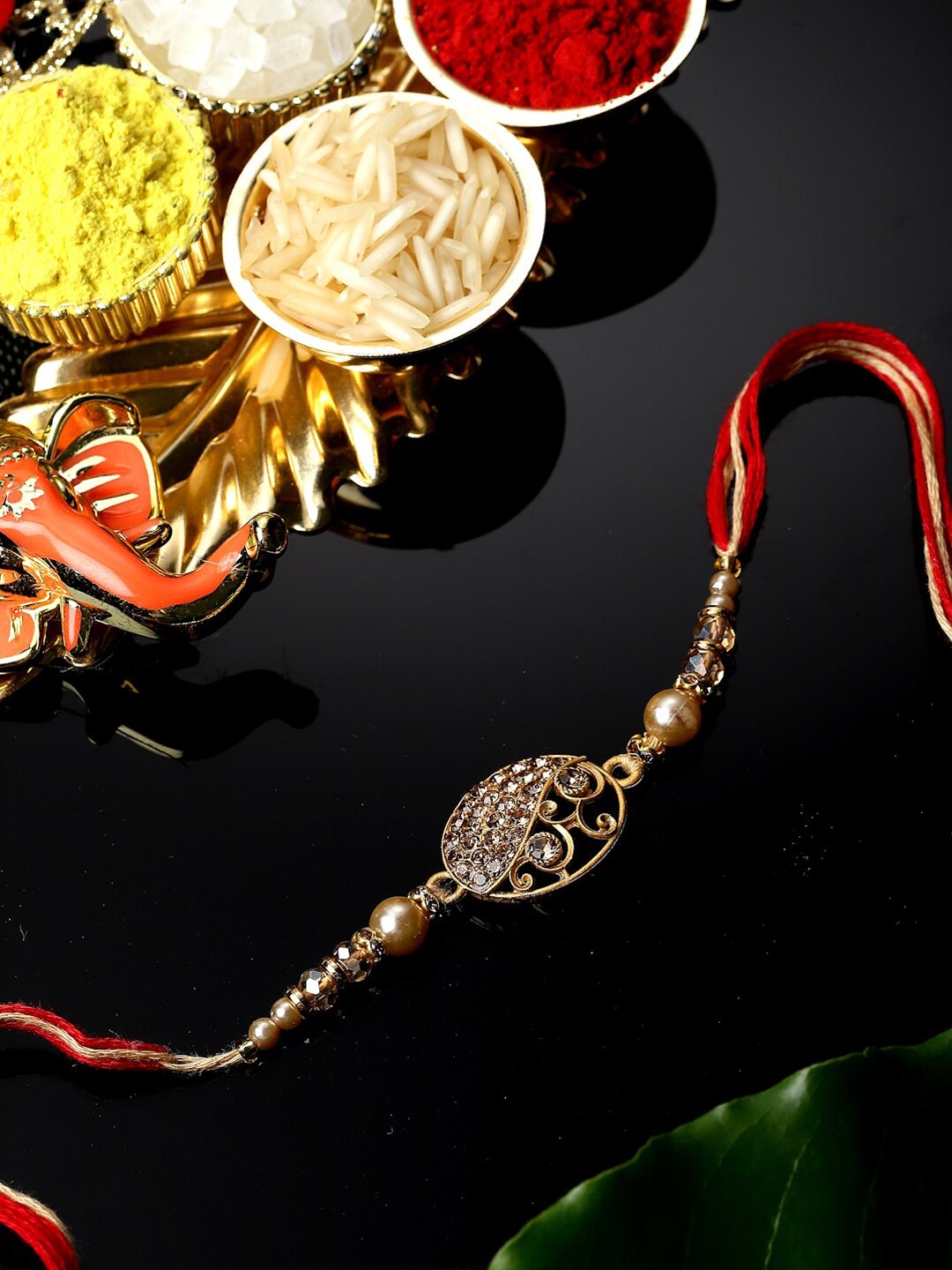 

ZENEME Meenakari Stones Studded & Beaded Thread Rakhi, Red