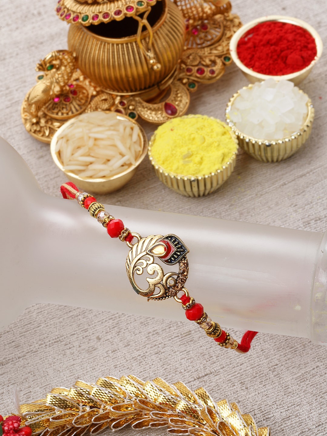 

ZENEME Carved Artificial Stone & Beads Rakhi, Multi
