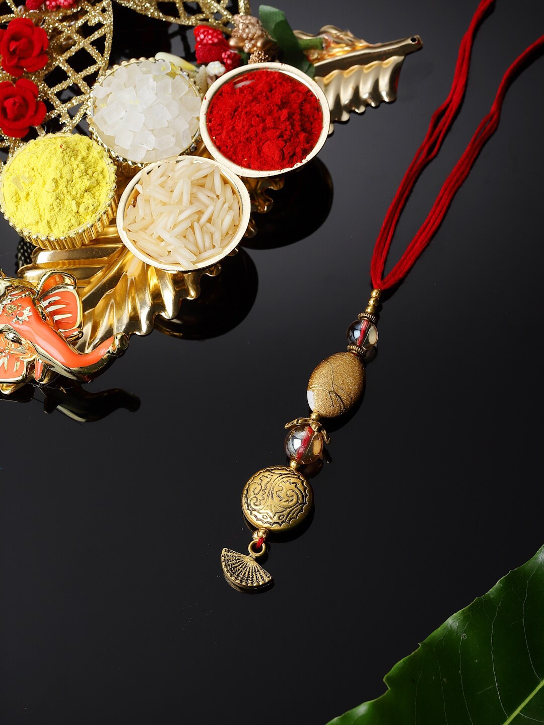 

ZENEME Gold-Toned Beaded Lumba Rakhi For Bhabhi With Roli Chawal, Off white