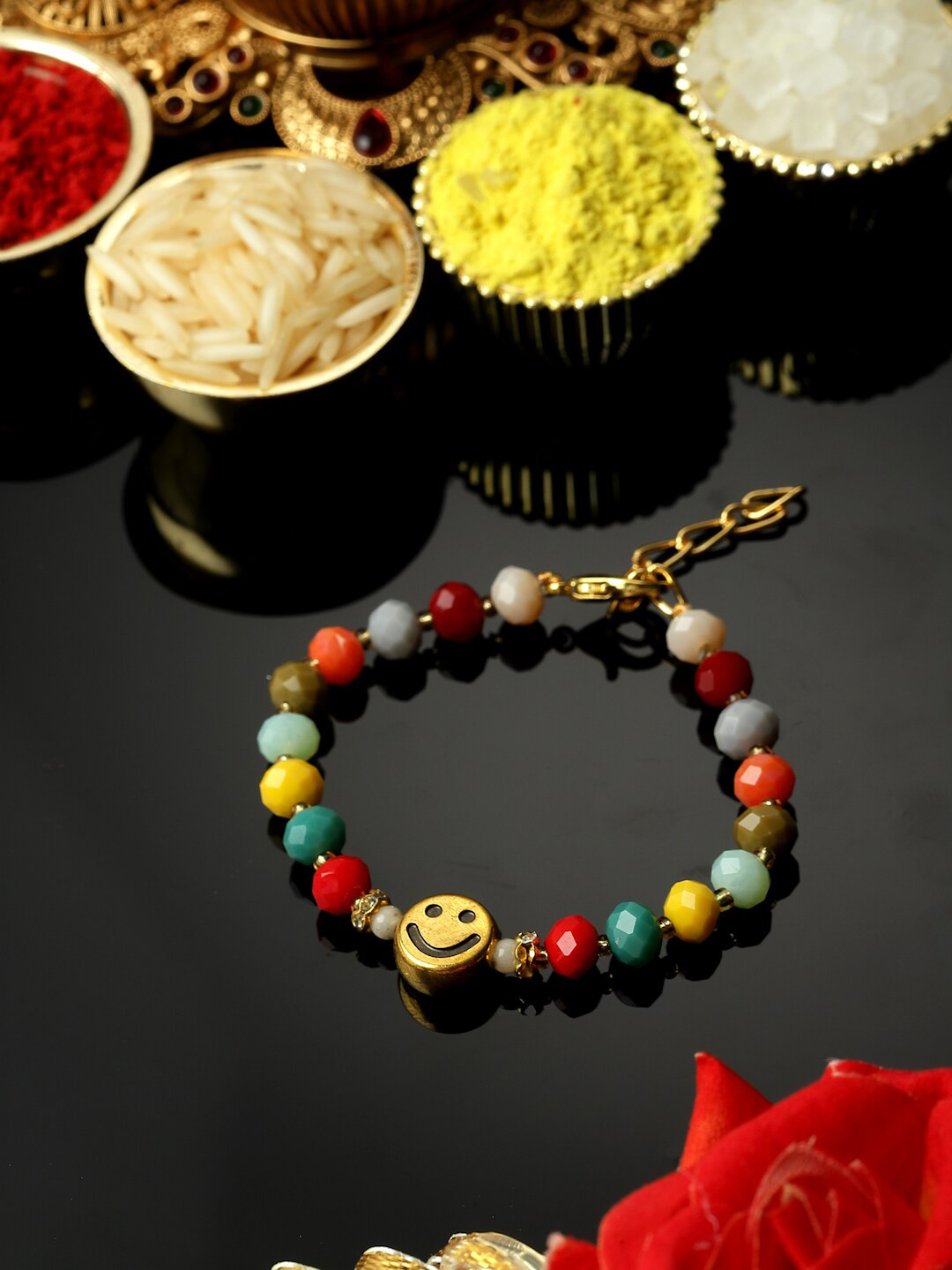 

ZENEME Artificial Stones Studded Smiley Rakhi, Multi