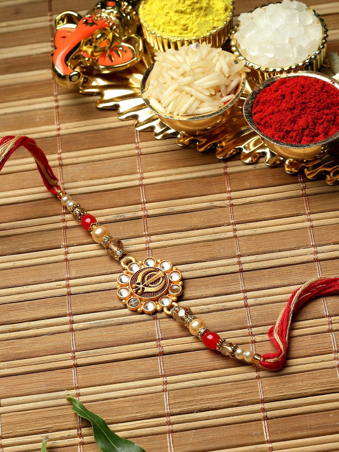 

ZENEME Gold-Toned Rakhi