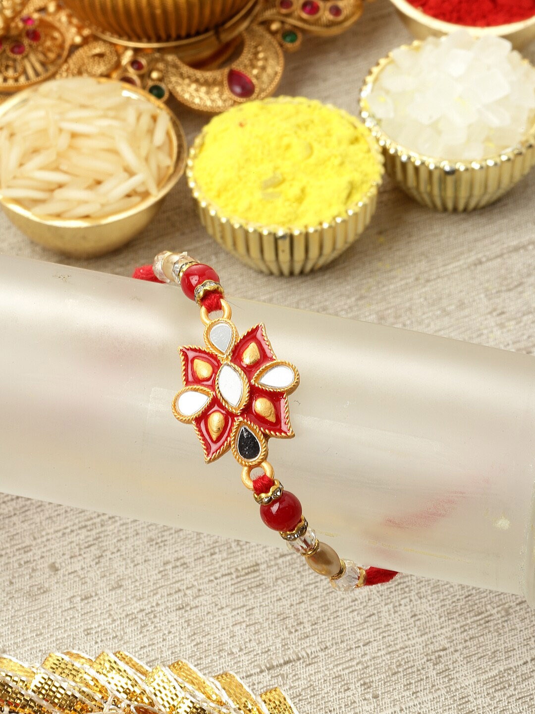 

ZENEME Enamelled & Kundan Studded Rakhi, Red