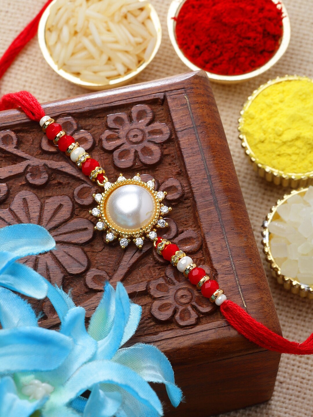 

ZENEME Pearl & Artificial Beads Studded Thread Rakhi, Multi