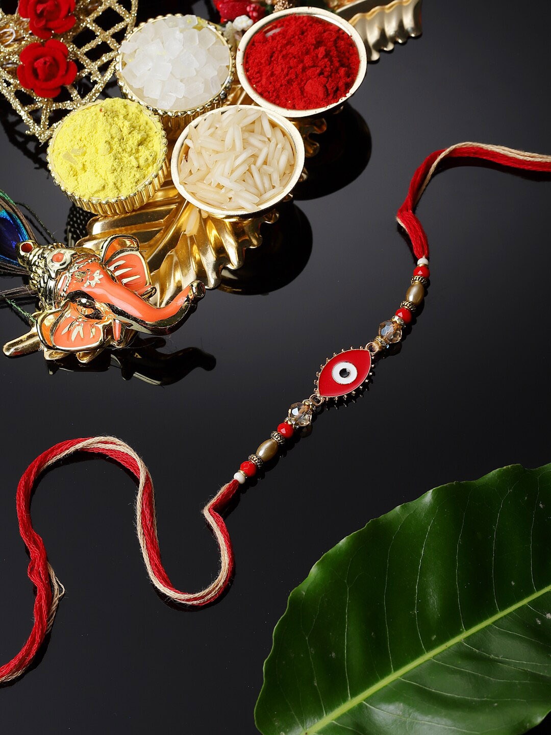 

ZENEME Gold-Toned Evil Eye Rakhi Gift Set, Red