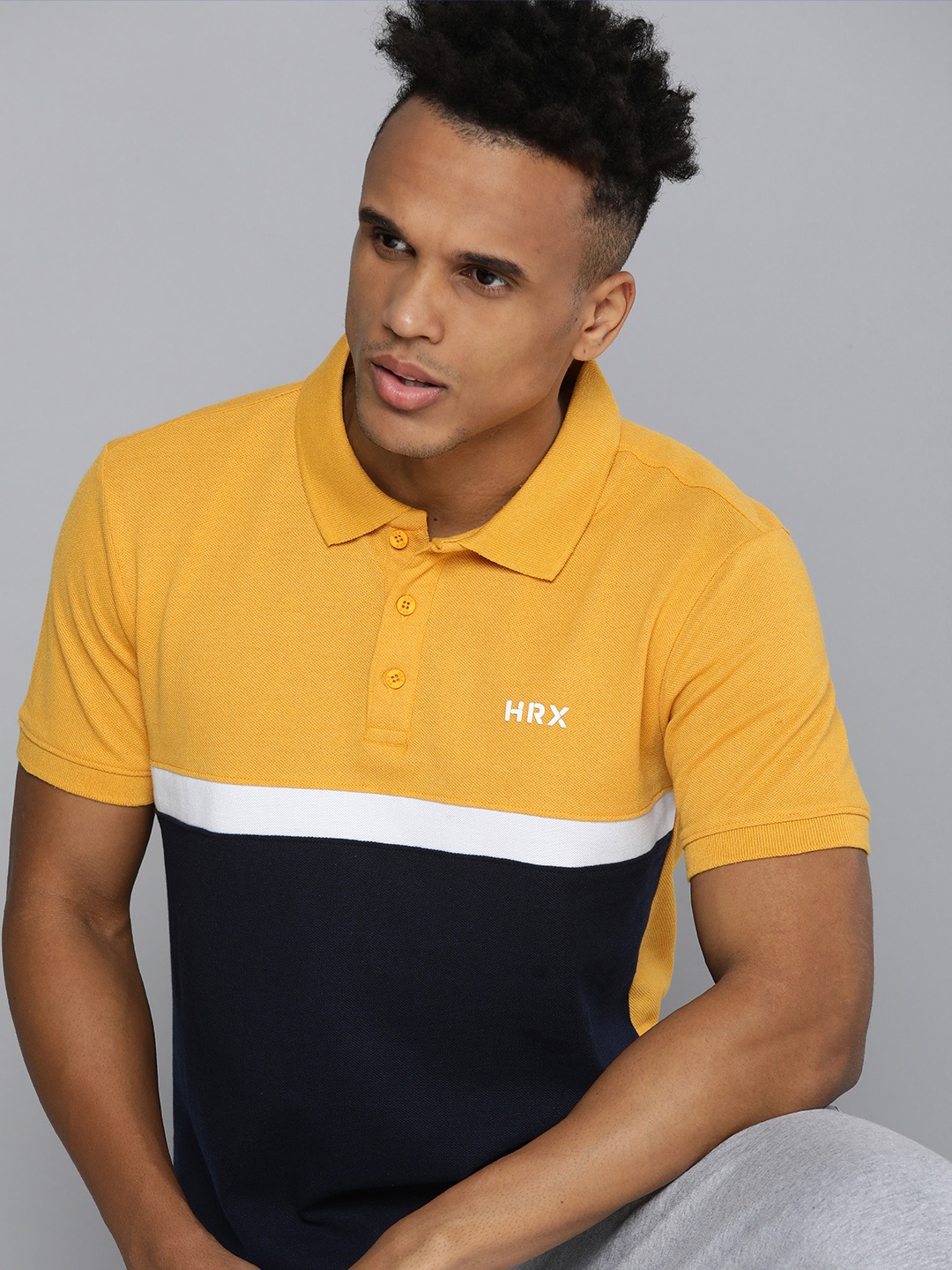 

HRX by Hrithik Roshan Colourblocked Polo Collar T-shirt, Mustard