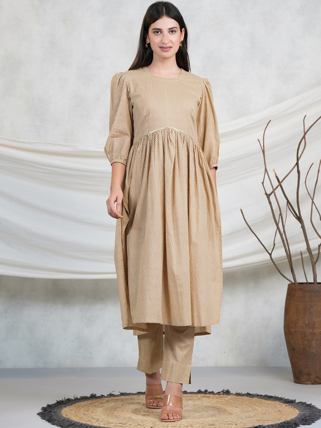 

Adveta Chevron Pleated Puffed Sleeves Kurta With Trousers, Beige