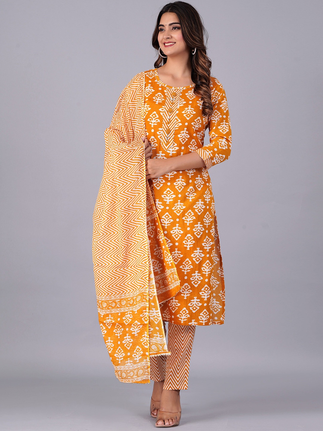 

KALINI Floral Printed Gotta Patti Straight Kurta With Trousers & Dupatta, Mustard