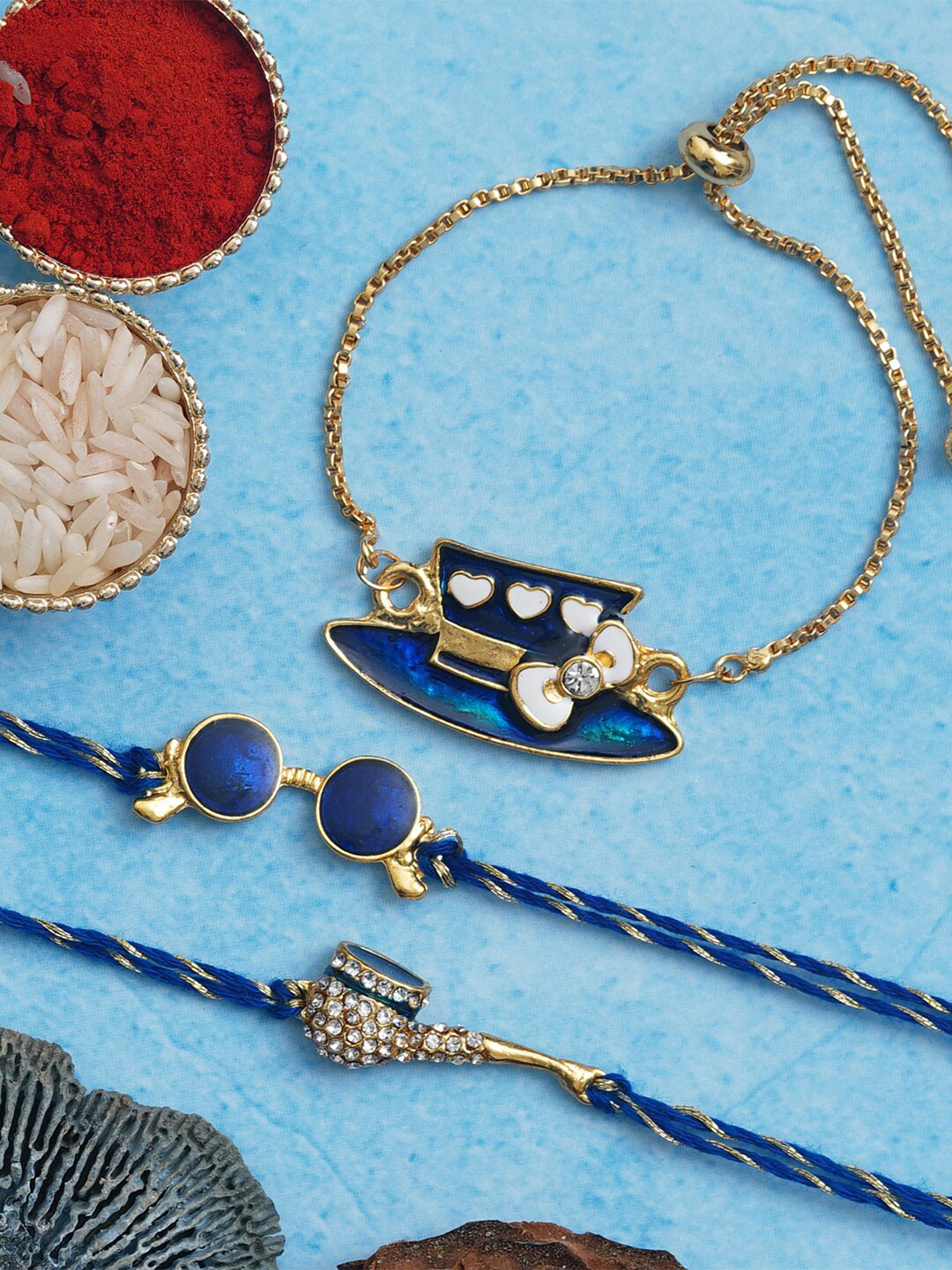 

Anil Rakhi Set of 3 Rakhi With Bracelet and Roli Chawal, Gold