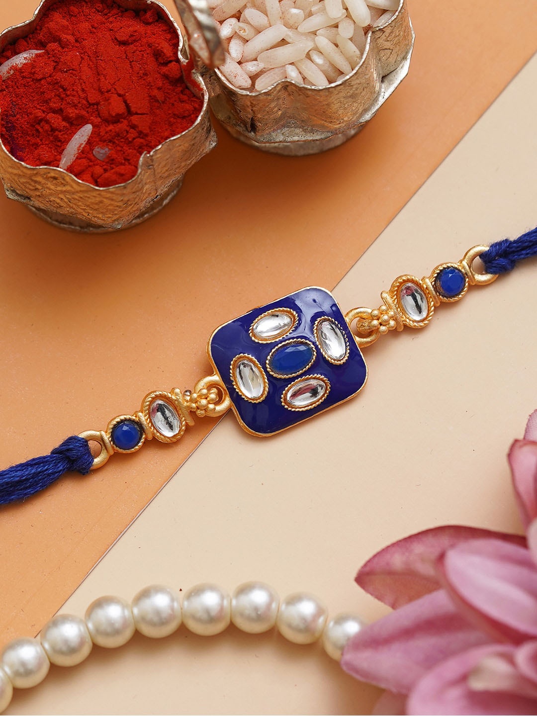 

Anil Rakhi Designer Rakhi With Roli Chawal Pack, Blue