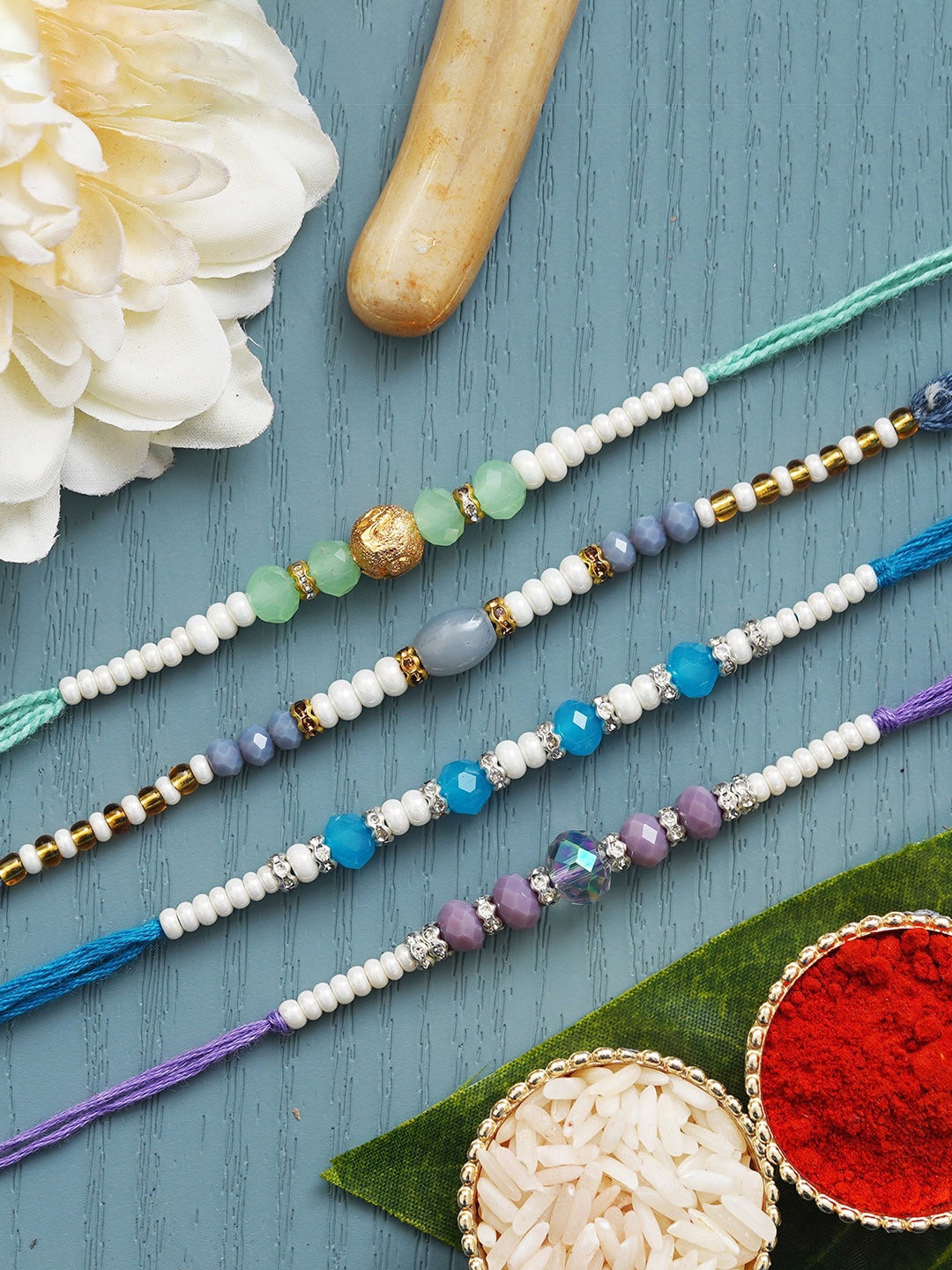 

Anil Rakhi Unisex Set Of 4 Designer Beaded Rakhi WIth Roli Chawal, White
