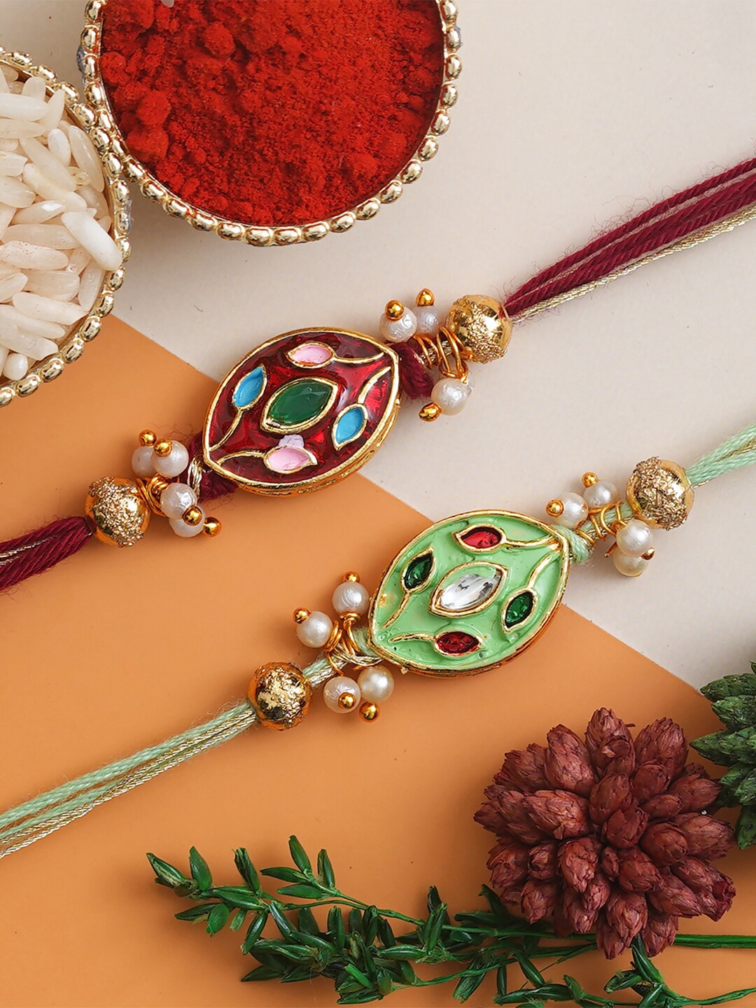 

Anil Rakhi Set of 2 Brown and Pista Green Pearls, Beads Rakhi & Roli Chawal Pack
