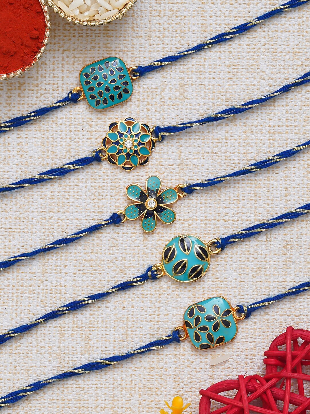 

Anil Rakhi Unisex Set of 5 Designer Rakhis With Roli Chawal Pack, Blue