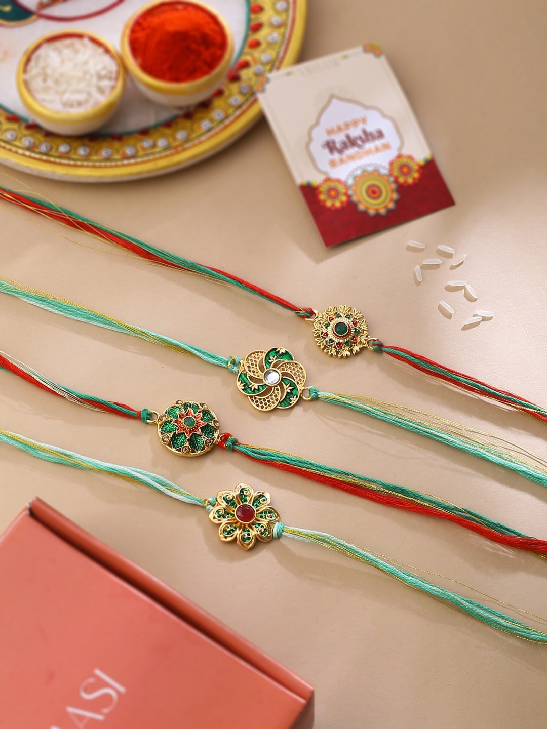 

VIRAASI Set of 4 Designer Rakhi With Roli Chawal & Card, Gold