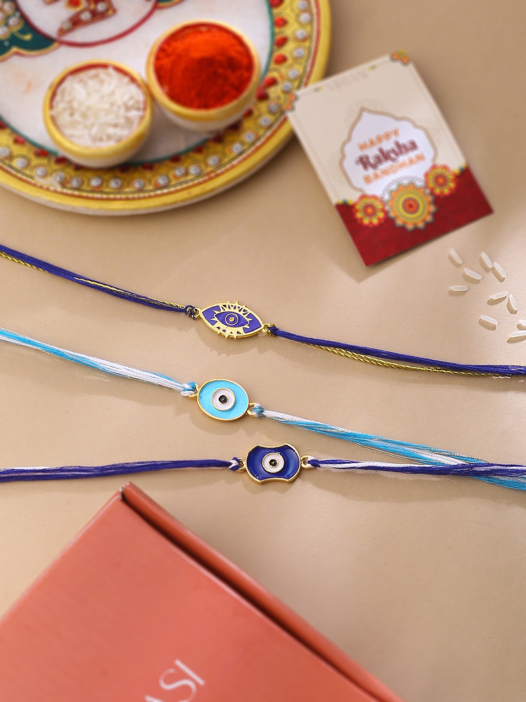 

VIRAASI Men Set Of 3 Evil Eye Thread Rakhis, Gold
