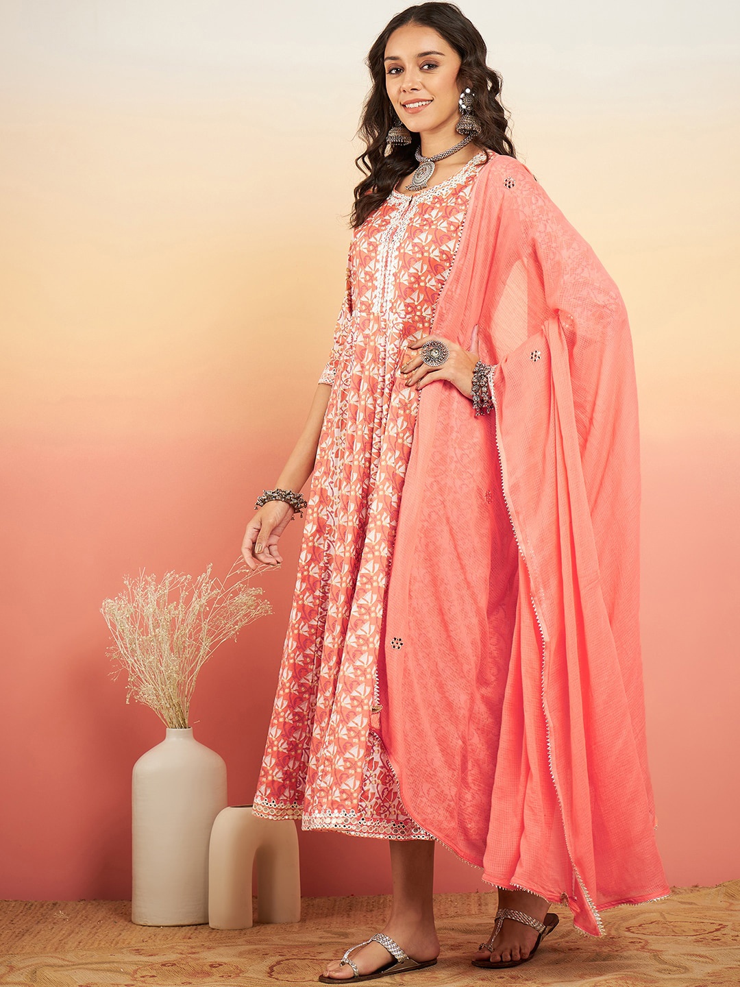 

Sangria Orange Floral Printed Fit and Flare Mirror Work Ethnic Dresses With Dupatta