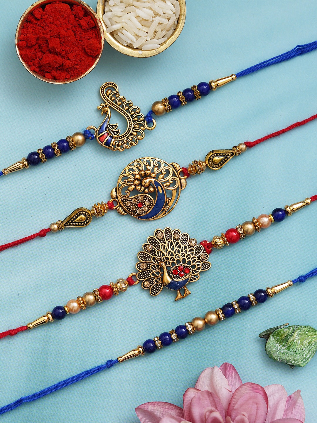 

eCraftIndia Set of 4 Thread Rakhis With Roli Chawal & Greetings Card, Red