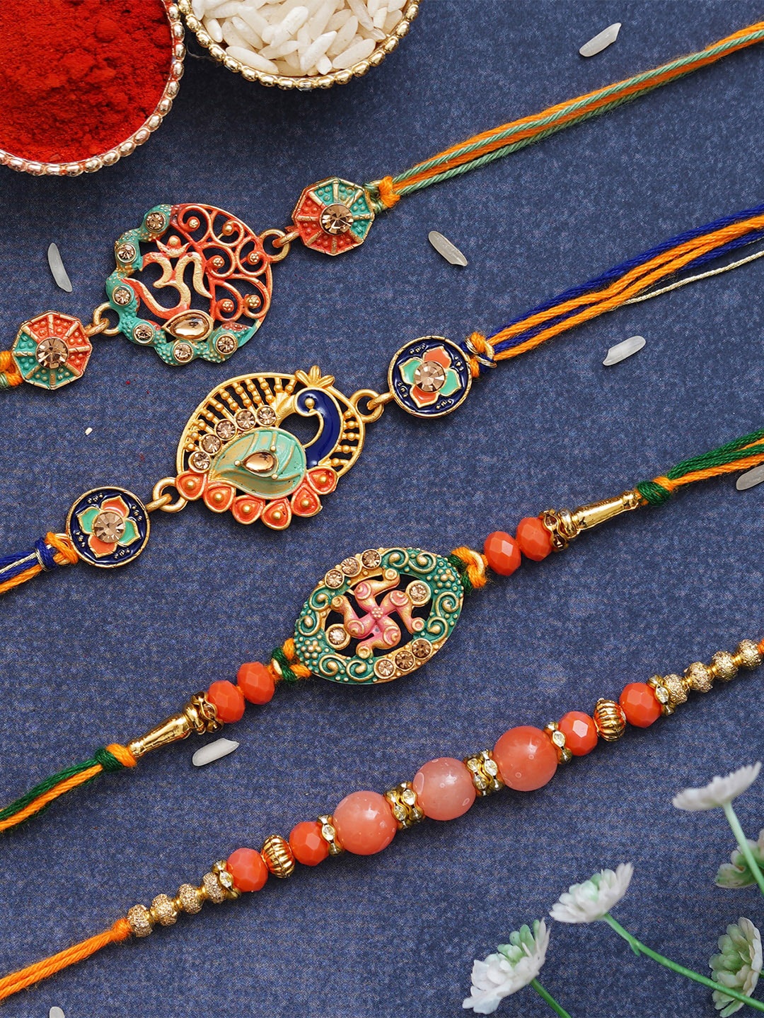 

eCraftIndia Unisex Set of 4 Thread Rakhis With Roli Chawal, Orange