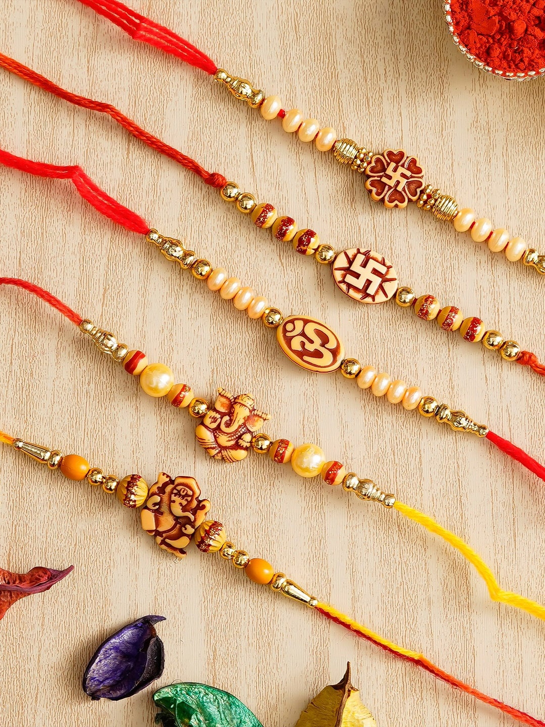 

eCraftIndia Set Of 5 Charm Thread Rakhis With Roli Chawal, Gold