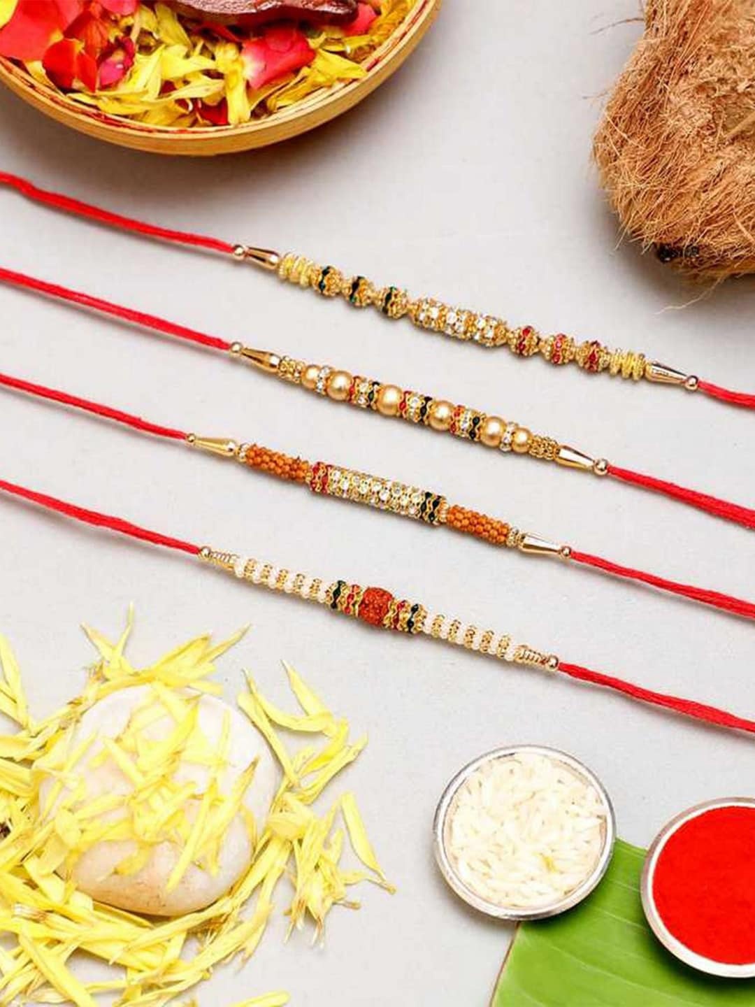 

eCraftIndia Set Of 4 Beads, American Diamonds, Rudraksh Rakhis With Roli Chawal, Red