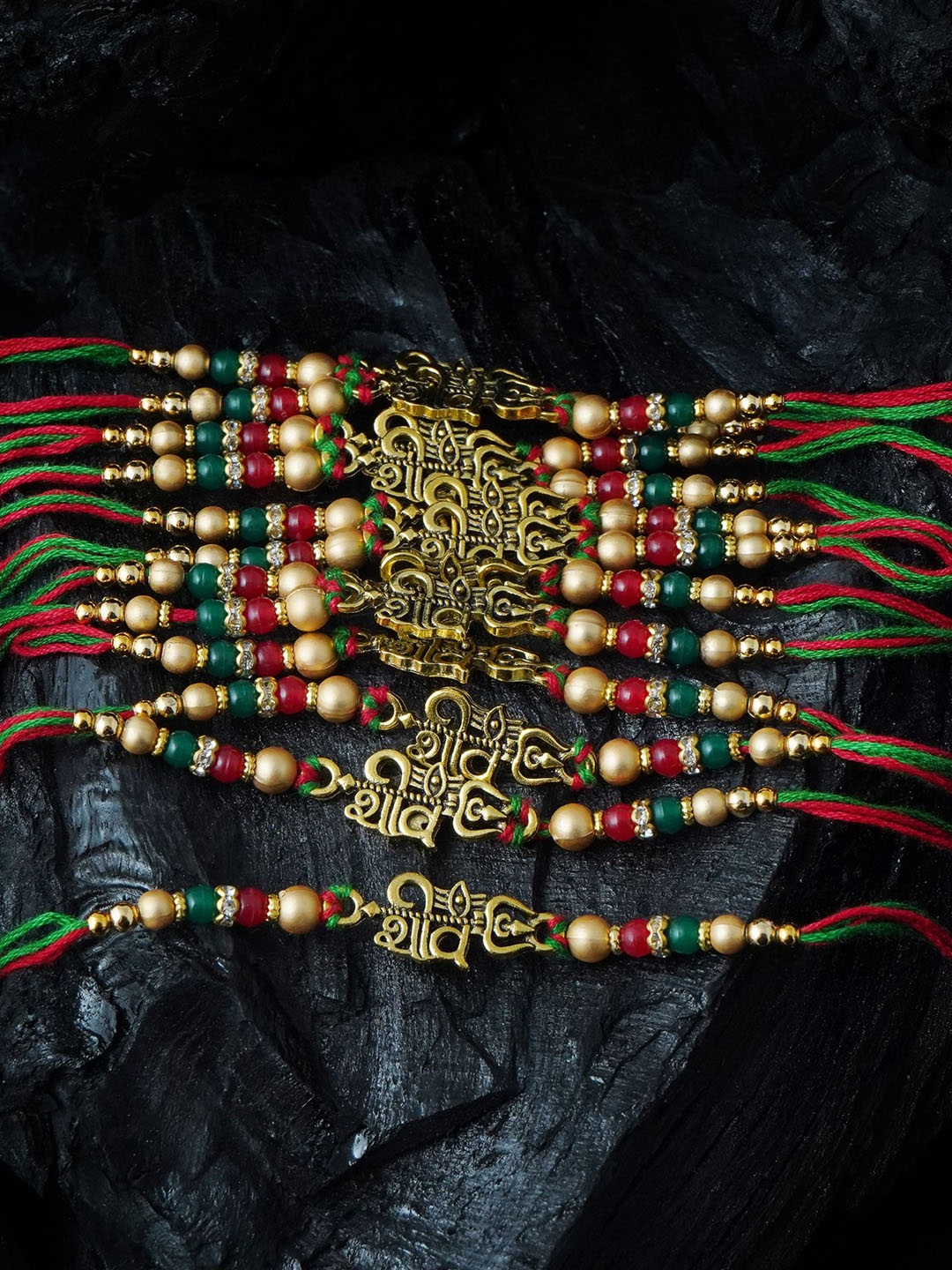 

MANSIYAORANGE Men Set Of 12 Pearl & Lord Shiva Trishul Cotton Charm Rakhi, Red