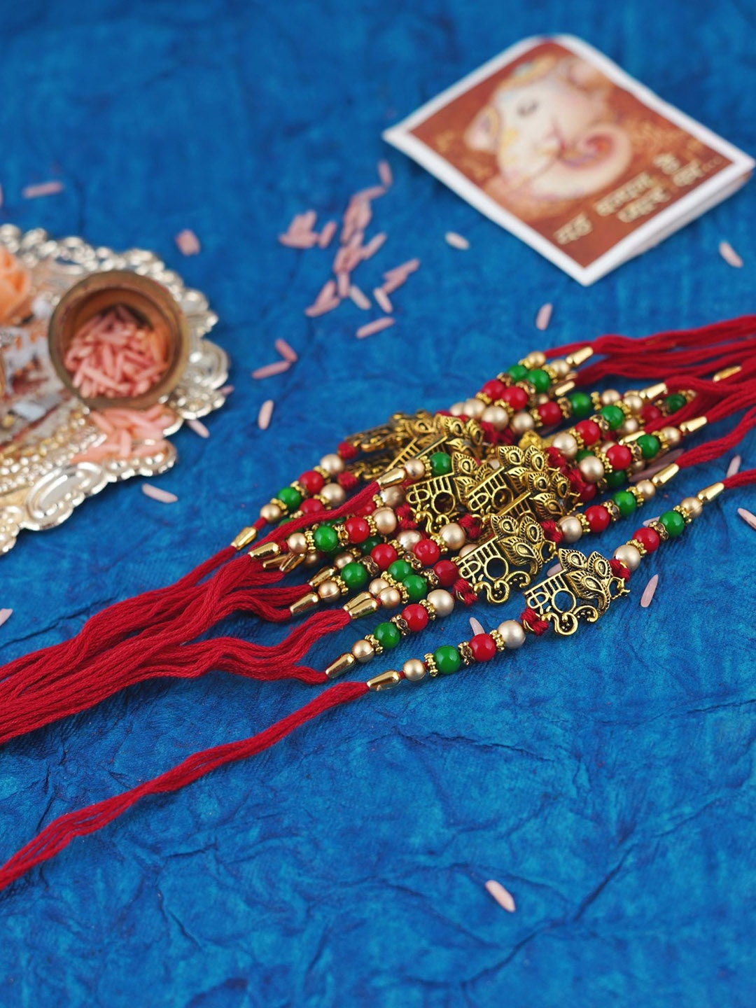 

MANSIYAORANGE Men Set Of 12 Pearl & Peacock Cotton Charm Rakhi, Red
