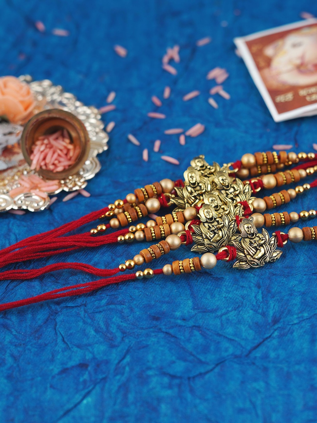 

MANSIYAORANGE Men Set Of 12 Pearl & Bal Krishna Cotton Charm Rakhi, Gold