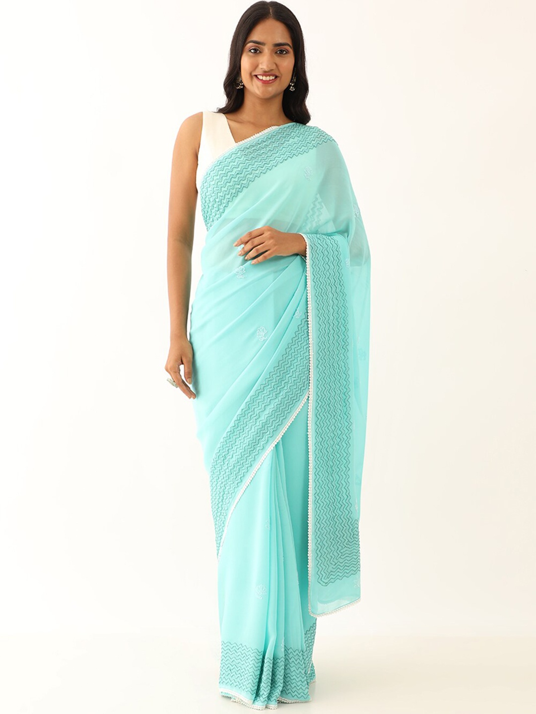 

Taneira Floral Embroidered Pure Georgette Saree, Blue