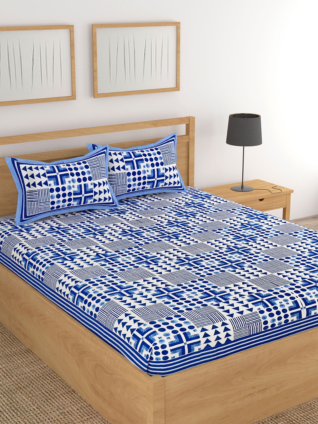 

Lali Prints Blue & White Geometric Cotton 180 TC King Bedsheet With 2 Pillow Covers