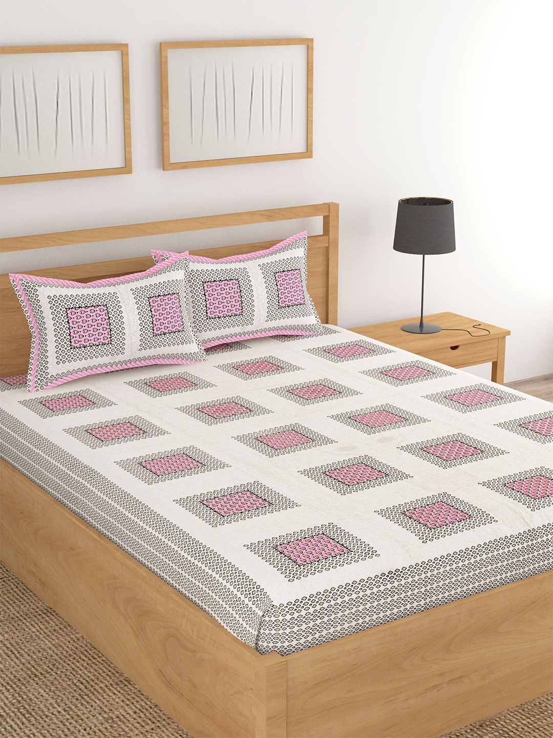 

Lali Prints Pink & White Printed Cotton 180 TC King Bedsheet with 2 Pillow Covers