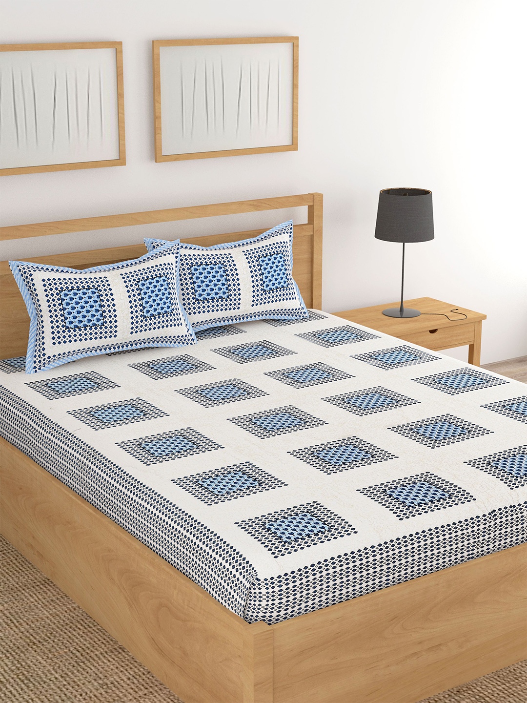 

Lali Prints White & Blue Printed 180 TC Cotton King Bedsheet With 2 Pillow Covers