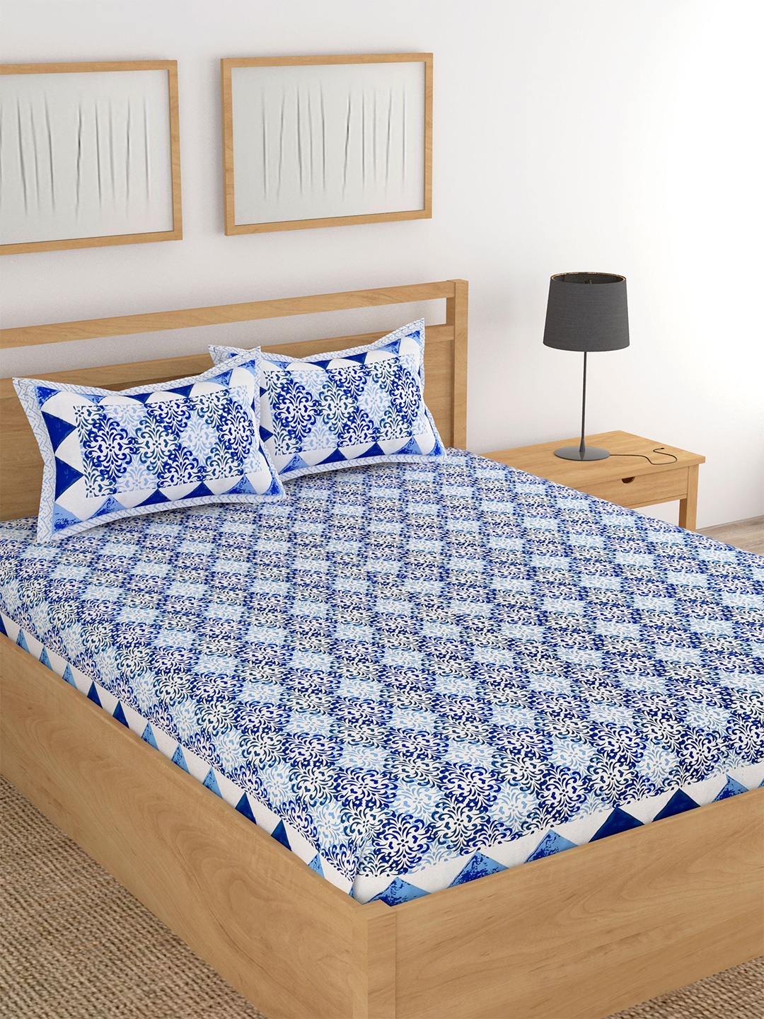 

Lali Prints Blue & White Geometric Cotton 180 TC King Bedsheet With 2 Pillow Covers