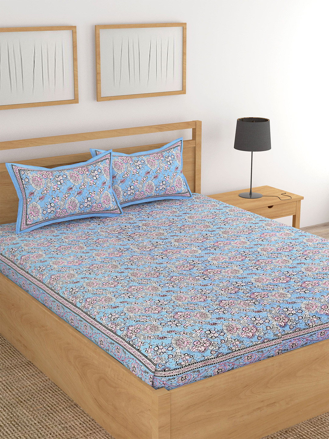 

Lali Prints Blue & White Floral Printed 180 TC King Cotton Bedsheet With 2 Pillow Covers
