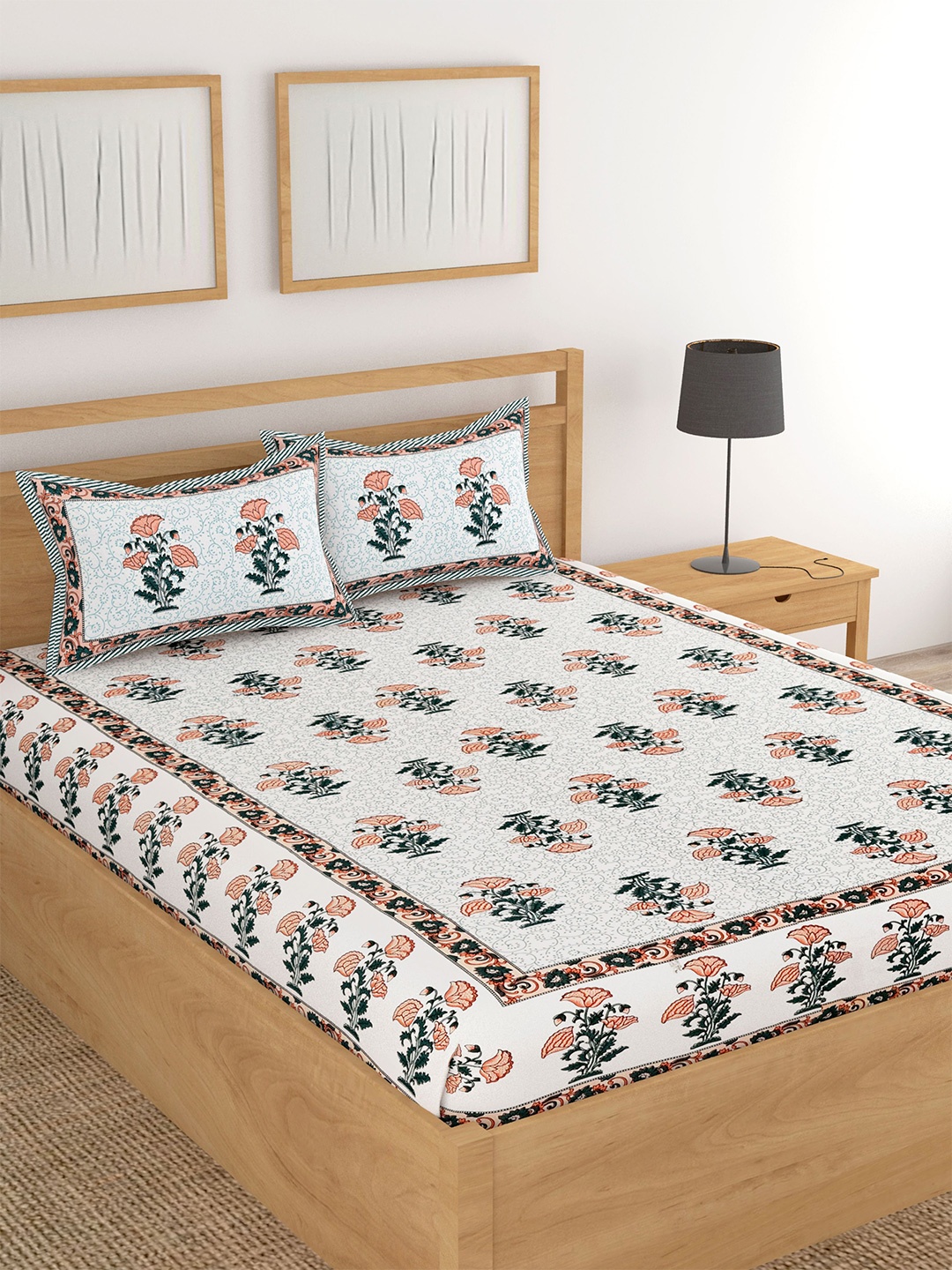 

Lali Prints White & Orange Floral Printed 180 TC Cotton King Bedsheet With 2 Pillow Covers