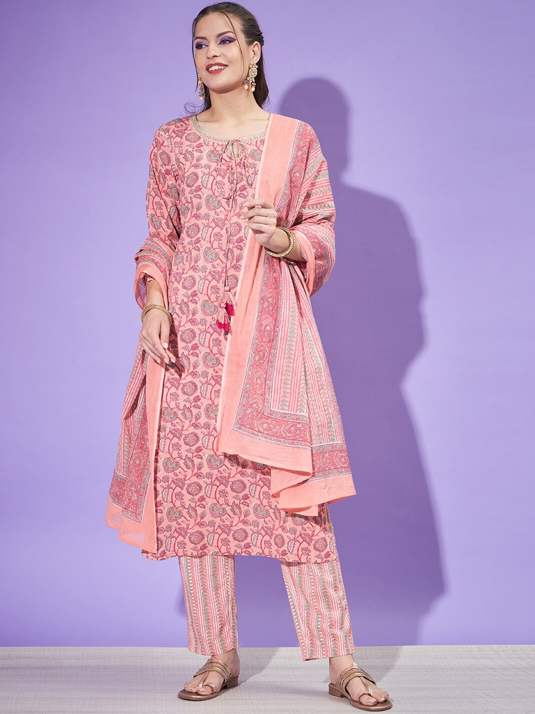 

Silai Bunai Peach Floral Printed Tie-up Neck Pure Cotton Kurta & Trousers With Dupatta