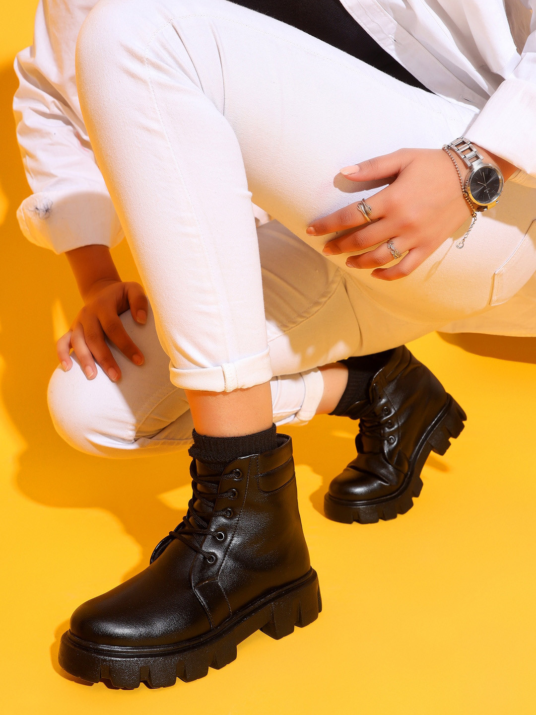 

The Roadster Lifestyle Co. Women Textured Heeled Mid-Top Chunky Boots, Black