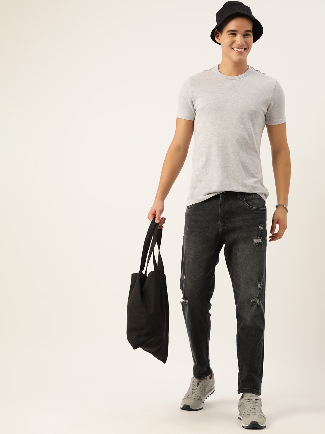 

Mast & Harbour Men Mildly Distressed Carrot Light Fade Stretchable Jeans, Black
